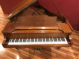 Example photo of a grand piano cabinet