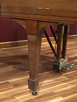 Example photo of a grand piano leg